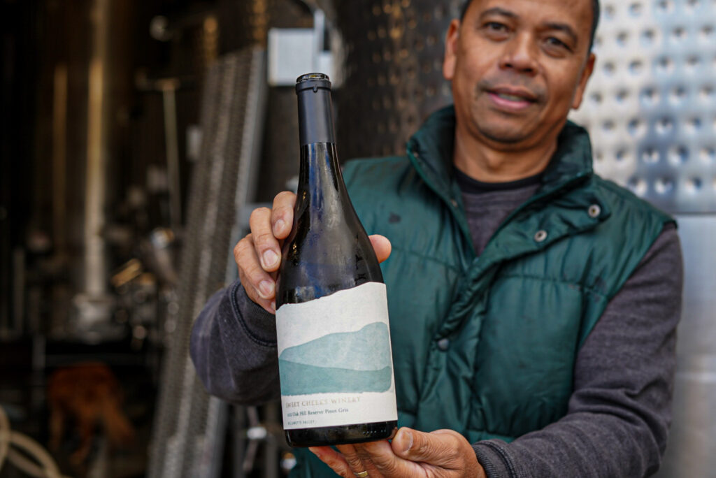 Winemaker Leo Gabica with Oak Hill Reserve Pinot Gris Bottle